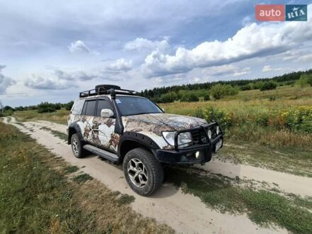 Белый Тойота Ленд Крузер, объемом двигателя 4.7 л и пробегом 490 тыс. км за 18000 $, фото 1 на Automoto.ua