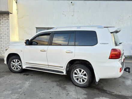 Белый Тойота Ленд Крузер, объемом двигателя 4 л и пробегом 370 тыс. км за 22000 $, фото 1 на Automoto.ua