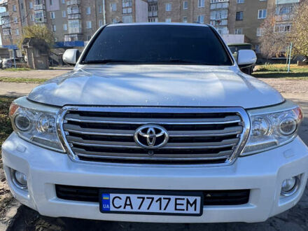 Білий Тойота Ленд Крузер, об'ємом двигуна 4.46 л та пробігом 265 тис. км за 25000 $, фото 1 на Automoto.ua