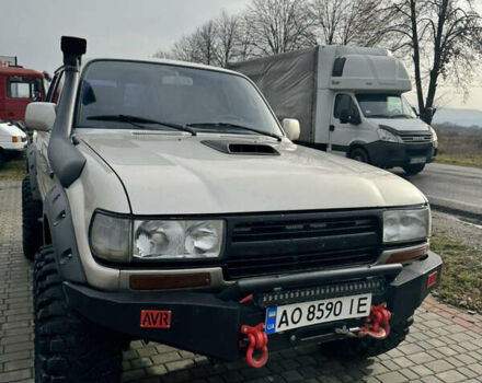 Бежевый Тойота Ленд Крузер, объемом двигателя 4.16 л и пробегом 300 тыс. км за 18900 $, фото 5 на Automoto.ua