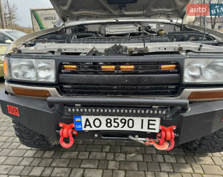 Бежевый Тойота Ленд Крузер, объемом двигателя 4.16 л и пробегом 300 тыс. км за 18900 $, фото 6 на Automoto.ua