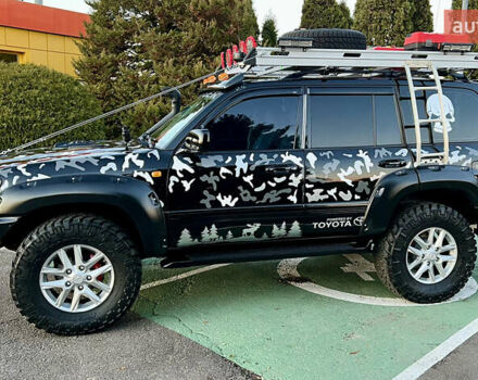 Черный Тойота Ленд Крузер, объемом двигателя 4.7 л и пробегом 430 тыс. км за 25000 $, фото 1 на Automoto.ua