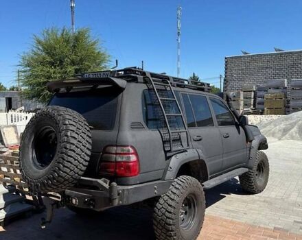 Черный Тойота Ленд Крузер, объемом двигателя 4.16 л и пробегом 242 тыс. км за 27000 $, фото 4 на Automoto.ua