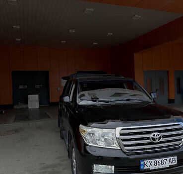 Чорний Тойота Ленд Крузер, об'ємом двигуна 5.66 л та пробігом 289 тис. км за 25000 $, фото 11 на Automoto.ua