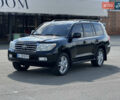 Черный Тойота Ленд Крузер, объемом двигателя 5.66 л и пробегом 335 тыс. км за 22900 $, фото 1 на Automoto.ua