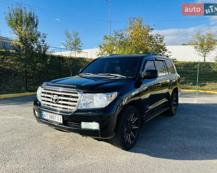 Черный Тойота Ленд Крузер, объемом двигателя 5.7 л и пробегом 239 тыс. км за 23500 $, фото 1 на Automoto.ua