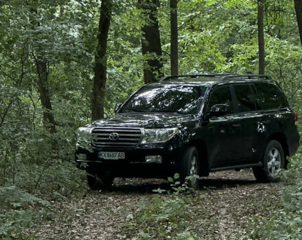 Чорний Тойота Ленд Крузер, об'ємом двигуна 5.66 л та пробігом 289 тис. км за 25000 $, фото 10 на Automoto.ua