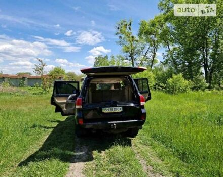 Чорний Тойота Ленд Крузер, об'ємом двигуна 4 л та пробігом 445 тис. км за 22000 $, фото 14 на Automoto.ua