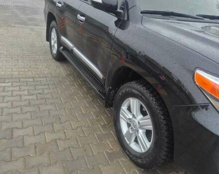 Чорний Тойота Ленд Крузер, об'ємом двигуна 4.46 л та пробігом 300 тис. км за 33000 $, фото 5 на Automoto.ua