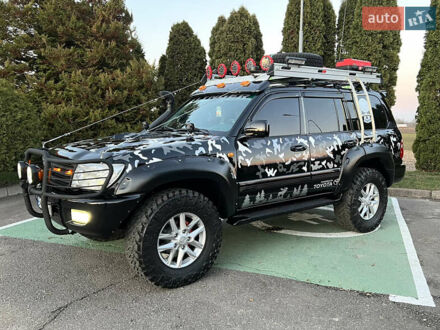 Черный Тойота Ленд Крузер, объемом двигателя 4.7 л и пробегом 430 тыс. км за 25000 $, фото 1 на Automoto.ua