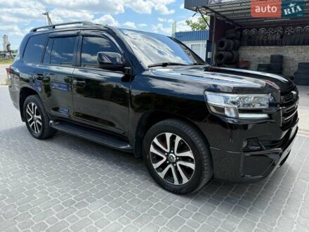 Черный Тойота Ленд Крузер, объемом двигателя 5.7 л и пробегом 220 тыс. км за 30000 $, фото 1 на Automoto.ua