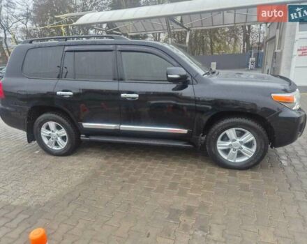Черный Тойота Ленд Крузер, объемом двигателя 4.46 л и пробегом 300 тыс. км за 33000 $, фото 1 на Automoto.ua
