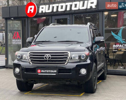 Чорний Тойота Ленд Крузер, об'ємом двигуна 4.7 л та пробігом 270 тис. км за 31900 $, фото 1 на Automoto.ua