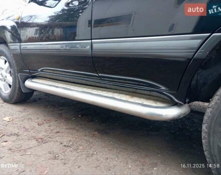 Коричневый Тойота Ленд Крузер, объемом двигателя 4.66 л и пробегом 260 тыс. км за 14000 $, фото 9 на Automoto.ua