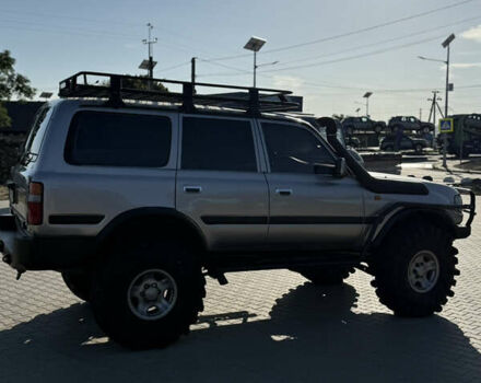 Сірий Тойота Ленд Крузер, об'ємом двигуна 3 л та пробігом 336 тис. км за 32000 $, фото 3 на Automoto.ua