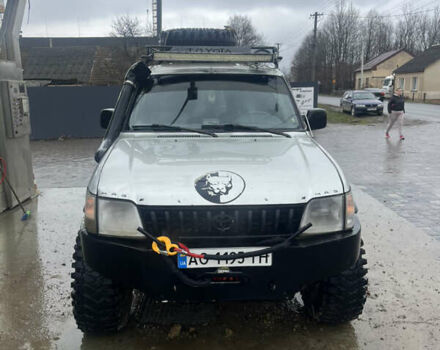 Серый Тойота Ленд Крузер, объемом двигателя 3 л и пробегом 300 тыс. км за 15000 $, фото 2 на Automoto.ua