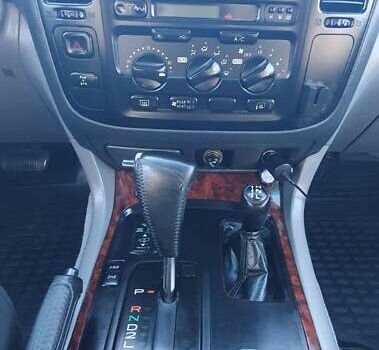 Сірий Тойота Ленд Крузер, об'ємом двигуна 4.2 л та пробігом 356 тис. км за 15000 $, фото 9 на Automoto.ua