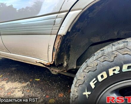 Серый Тойота Ленд Крузер, объемом двигателя 4.7 л и пробегом 419 тыс. км за 10000 $, фото 2 на Automoto.ua