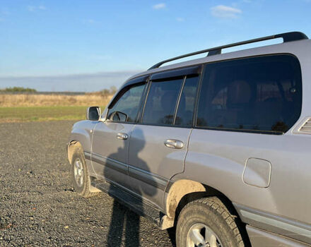 Сірий Тойота Ленд Крузер, об'ємом двигуна 4.66 л та пробігом 248 тис. км за 13099 $, фото 3 на Automoto.ua