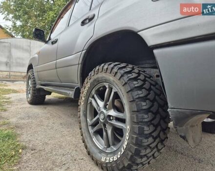 Серый Тойота Ленд Крузер, объемом двигателя 4.2 л и пробегом 453 тыс. км за 16500 $, фото 7 на Automoto.ua