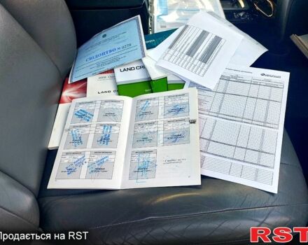 Серый Тойота Ленд Крузер, объемом двигателя 5.7 л и пробегом 244 тыс. км за 23300 $, фото 8 на Automoto.ua