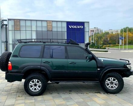 Зеленый Тойота Ленд Крузер, объемом двигателя 4.2 л и пробегом 350 тыс. км за 14600 $, фото 2 на Automoto.ua