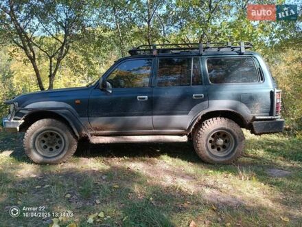 Зеленый Тойота Ленд Крузер, объемом двигателя 4.2 л и пробегом 100 тыс. км за 12500 $, фото 1 на Automoto.ua