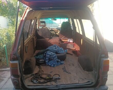 Красный Тойота Лит Айс, объемом двигателя 2 л и пробегом 400 тыс. км за 534 $, фото 1 на Automoto.ua