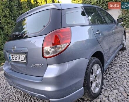 Синій Тойота Matrix, об'ємом двигуна 1.8 л та пробігом 247 тис. км за 4700 $, фото 11 на Automoto.ua