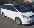 Белый Тойота Превиа, объемом двигателя 2.45 л и пробегом 300 тыс. км за 3800 $, фото 1 на Automoto.ua