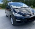 Черный Тойота Превиа, объемом двигателя 2.4 л и пробегом 310 тыс. км за 6500 $, фото 1 на Automoto.ua