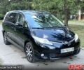 Черный Тойота Превиа, объемом двигателя 2.4 л и пробегом 128 тыс. км за 10900 $, фото 1 на Automoto.ua