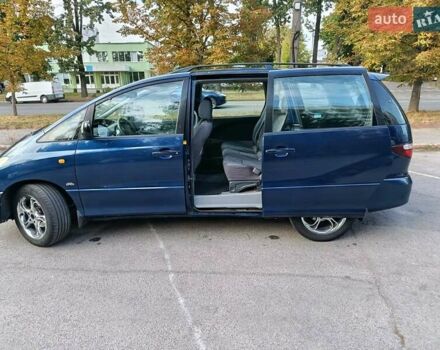 Синій Тойота Превіа, об'ємом двигуна 2 л та пробігом 197 тис. км за 6500 $, фото 24 на Automoto.ua