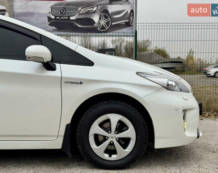 Белый Тойота Приус, объемом двигателя 1.8 л и пробегом 165 тыс. км за 12700 $, фото 78 на Automoto.ua