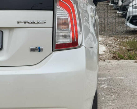 Белый Тойота Приус, объемом двигателя 1.8 л и пробегом 165 тыс. км за 12800 $, фото 84 на Automoto.ua