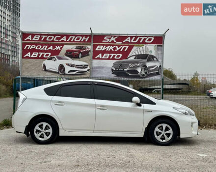 Белый Тойота Приус, объемом двигателя 1.8 л и пробегом 165 тыс. км за 12800 $, фото 77 на Automoto.ua