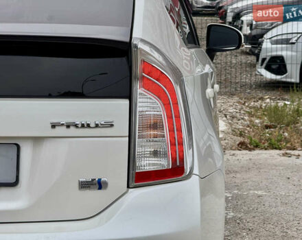 Белый Тойота Приус, объемом двигателя 1.8 л и пробегом 165 тыс. км за 12800 $, фото 85 на Automoto.ua