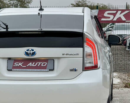 Белый Тойота Приус, объемом двигателя 1.8 л и пробегом 165 тыс. км за 12800 $, фото 82 на Automoto.ua