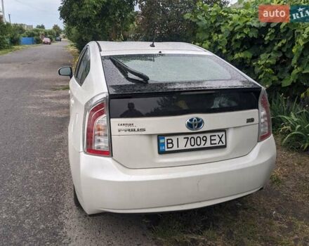 Белый Тойота Приус, объемом двигателя 1.8 л и пробегом 179 тыс. км за 12500 $, фото 2 на Automoto.ua