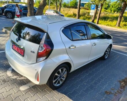Білий Тойота Пріус, об'ємом двигуна 1.5 л та пробігом 73 тис. км за 12800 $, фото 2 на Automoto.ua