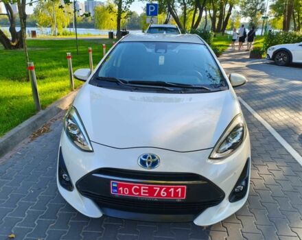 Білий Тойота Пріус, об'ємом двигуна 1.5 л та пробігом 73 тис. км за 12800 $, фото 1 на Automoto.ua