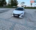 Белый Тойота Приус, объемом двигателя 1.8 л и пробегом 205 тыс. км за 22000 $, фото 1 на Automoto.ua
