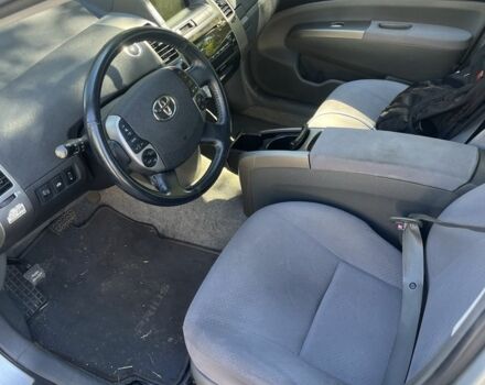 Белый Тойота Приус, объемом двигателя 1.6 л и пробегом 180 тыс. км за 5700 $, фото 1 на Automoto.ua