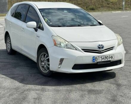 Белый Тойота Приус, объемом двигателя 1.8 л и пробегом 300 тыс. км за 9000 $, фото 1 на Automoto.ua