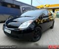 Черный Тойота Приус, объемом двигателя 1.5 л и пробегом 300 тыс. км за 7000 $, фото 1 на Automoto.ua