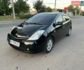 Черный Тойота Приус, объемом двигателя 1.5 л и пробегом 489 тыс. км за 8000 $, фото 1 на Automoto.ua