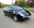 Черный Тойота Приус, объемом двигателя 1.5 л и пробегом 489 тыс. км за 8000 $, фото 1 на Automoto.ua