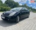 Черный Тойота Приус, объемом двигателя 1.5 л и пробегом 250 тыс. км за 6500 $, фото 1 на Automoto.ua