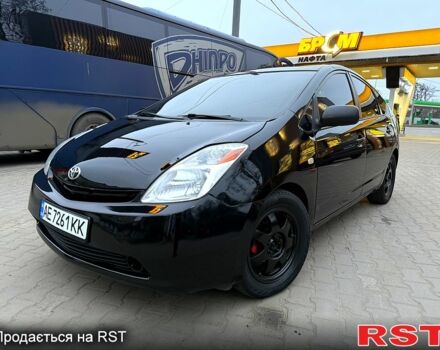 Черный Тойота Приус, объемом двигателя 1.5 л и пробегом 300 тыс. км за 7000 $, фото 1 на Automoto.ua