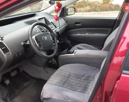 Красный Тойота Приус, объемом двигателя 1.5 л и пробегом 226 тыс. км за 6500 $, фото 22 на Automoto.ua